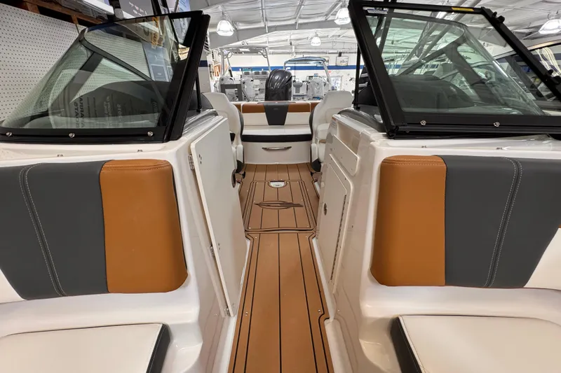 Slide: The Image of 2026 Chaparral 23 SSi OB boat interior with sleek seating and modern design. - 5