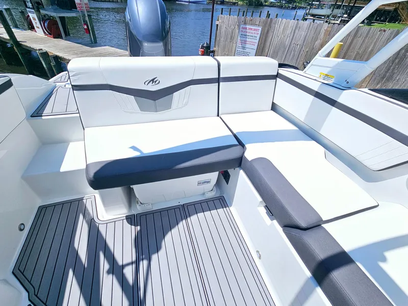Slide: The Image of Interior of a 2019 Monterey M-205 boat with gray and white seating. - 12