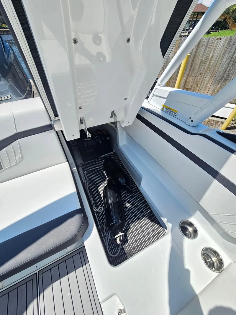 Slide: The Image of Interior of a 2019 Monterey M-205 boat with storage compartment. - 13