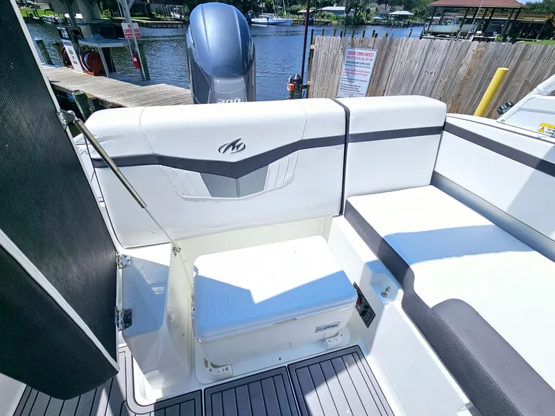 Slide: The Image of Interior of a 2019 Monterey M-205 boat with white seating area. - 14
