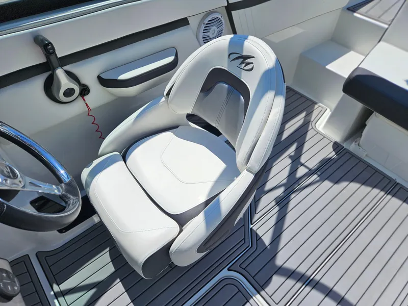 Slide: The Image of Interior of a 2019 Monterey M-205 boat with white seating. - 21