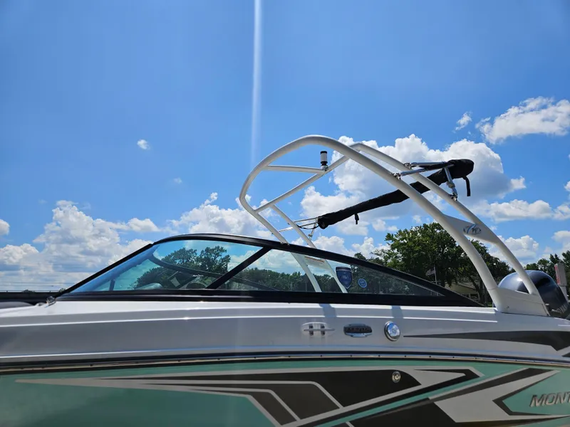 Slide: The Image of 2019 Monterey M-205 boat under blue sky. - 3