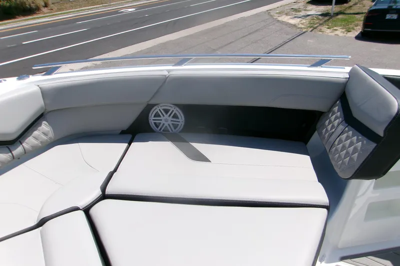 Slide: The Image of Luxurious seating on 2026 Monterey Elite 30 OB boat, featuring sleek design and comfortable upholstery. - 13