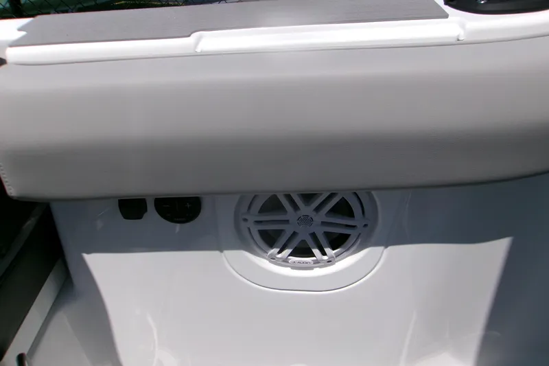 Slide: The Image of 2026 Monterey Elite 30 OB boat interior with speaker and control panel. - 17