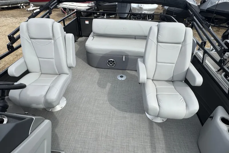Slide: The Image of 2024 Regency 250 DL3 boat interior with plush gray seating and modern design. - 7
