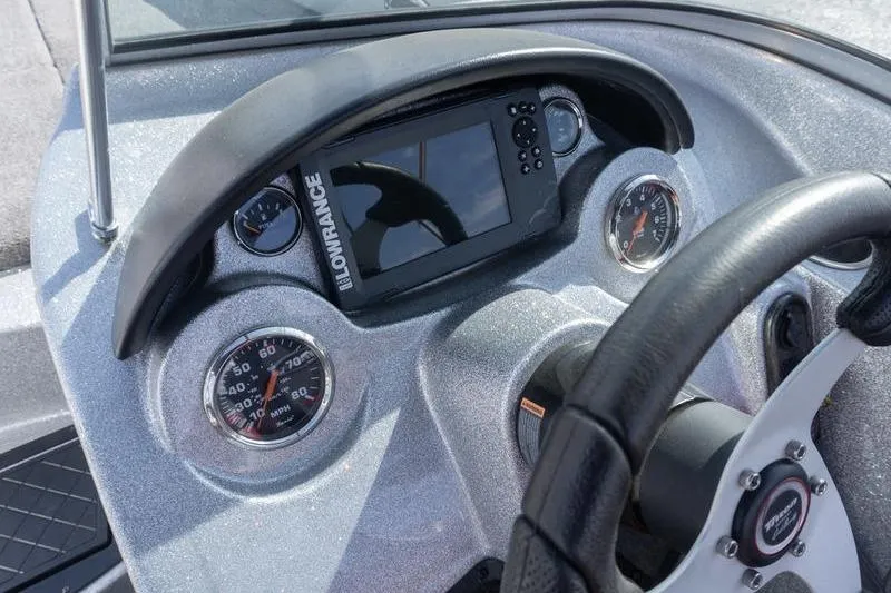 Slide: The Image of Dashboard of a 2012 Triton 190 SE boat with Lowrance display and gauges. - 8