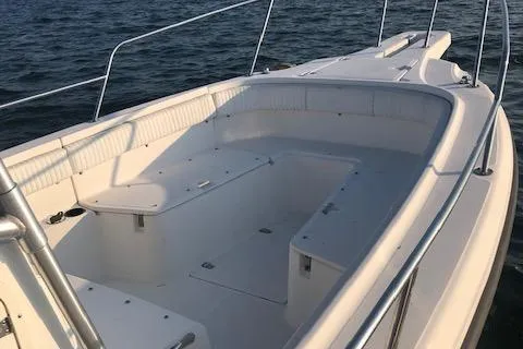 Slide: The Image of 1999 Boston Whaler Outrage 26 on calm waters. - 10