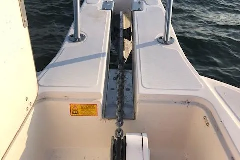 Slide: The Image of Anchor chain on a 1999 Boston Whaler Outrage 26 boat. - 12