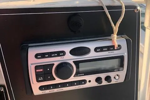 Slide: The Image of Boat stereo system on 1999 Boston Whaler Outrage 26. - 18