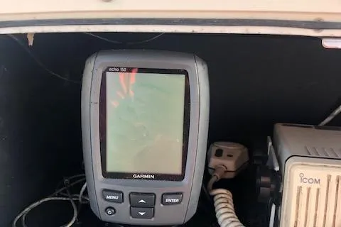 Slide: The Image of Garmin Echo 150 and Icom radio on 1999 Boston Whaler Outrage 26. - 19