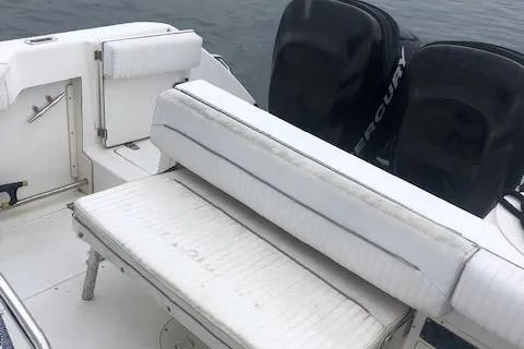 Slide: The Image of Boston Whaler Outrage 26 boat seating, 1999 model, with Mercury engines. - 24