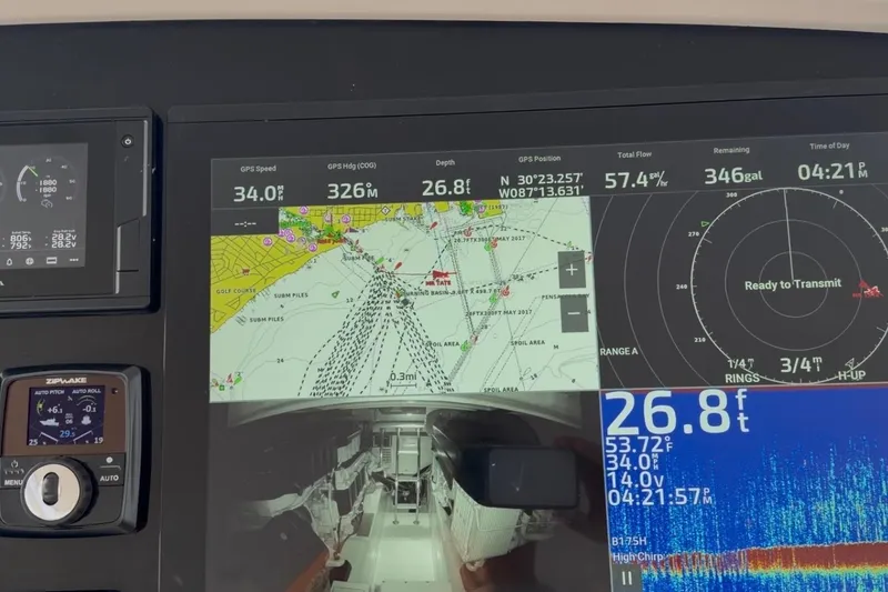 Slide: The Image of Navigation display on a 2020 Mag Bay 42 boat showing GPS and sonar data. - 14