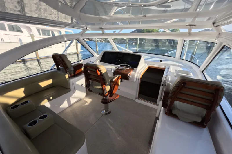 Slide: The Image of Interior of 2020 Mag Bay 42 yacht with luxurious seating and helm station. - 23