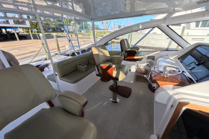 Slide: The Image of Interior of 2020 Mag Bay 42 boat with luxurious seating and helm station. - 25