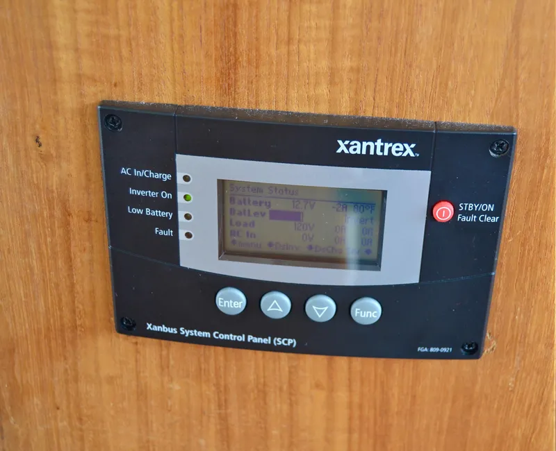 Slide: The Image of Xantrex control panel on 1994 Carver 370 Voyager. - 13