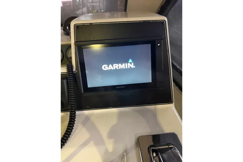 Slide: The Image of Garmin GPS display on 1994 Carver 370 Voyager boat dashboard. - 19