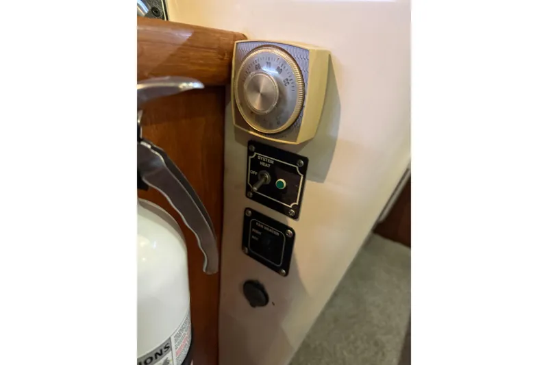 Slide: The Image of Thermostat and control panel on 1994 Carver 370 Voyager boat interior. - 20