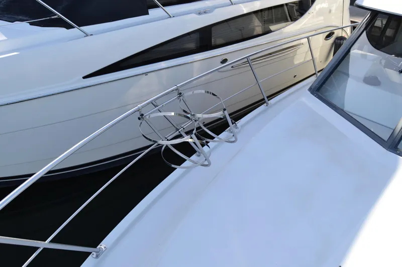 Slide: The Image of Carver 370 Voyager 1994, boat deck with railing and holders. - 34