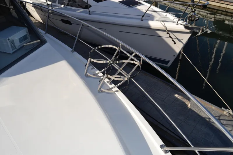 Slide: The Image of 1994 Carver 370 Voyager at dock, front deck view. - 35