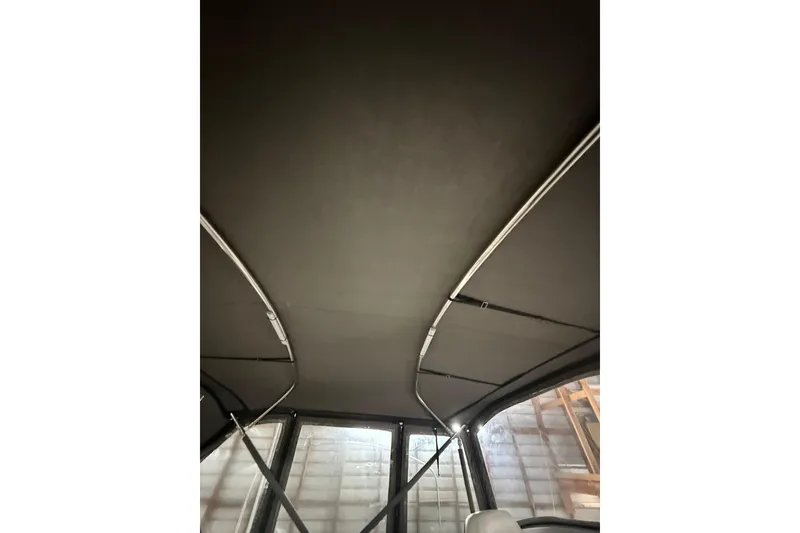 Slide: The Image of Interior view of a 1994 Carver 370 Voyager boat canopy and windows. - 45