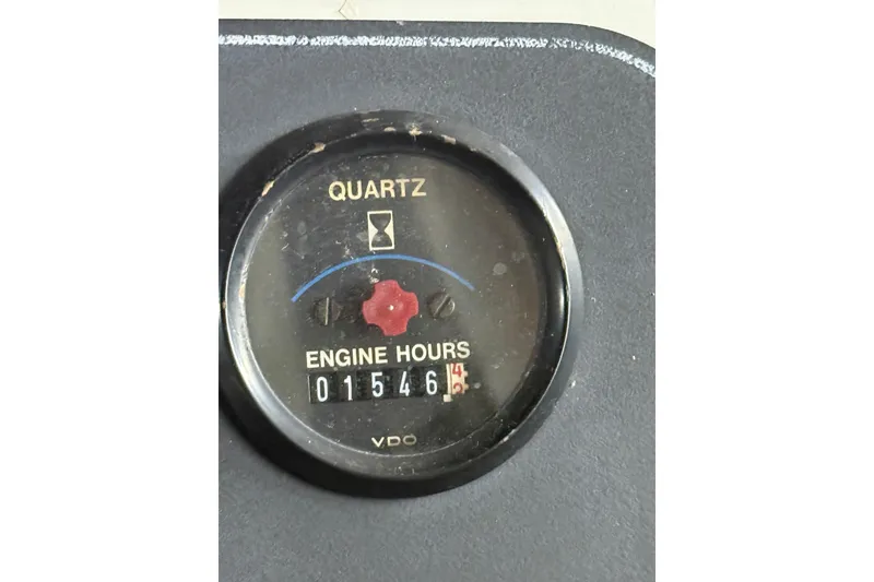 Slide: The Image of Engine hour meter showing 1546 hours on a 1994 Carver 370 Voyager. - 48