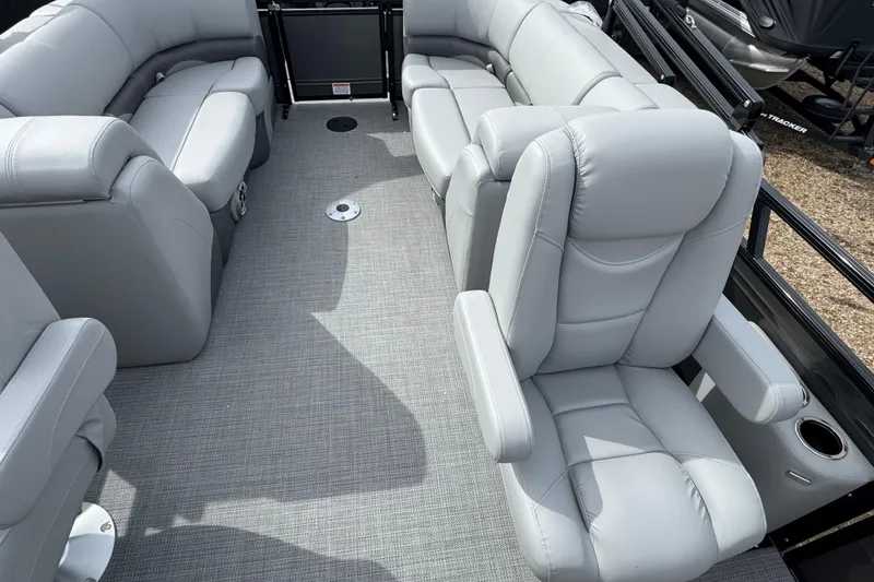 Slide: The Image of 2025 Regency 230 DL3 boat interior with luxurious gray seating and spacious layout. - 7