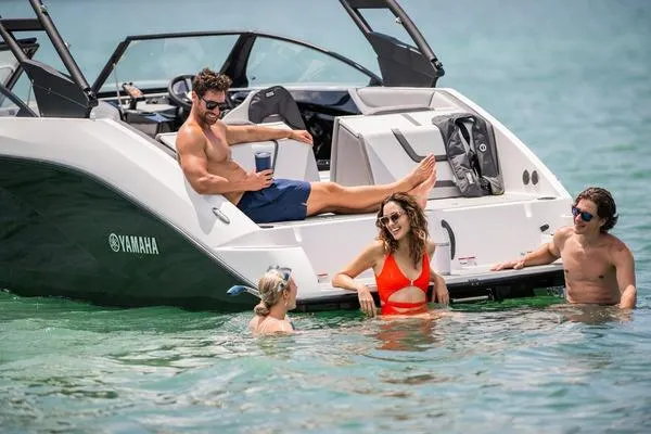 Slide: The Image of 2025 Yamaha Boats AR220 engine compartment showcasing dual Yamaha engines. - 10