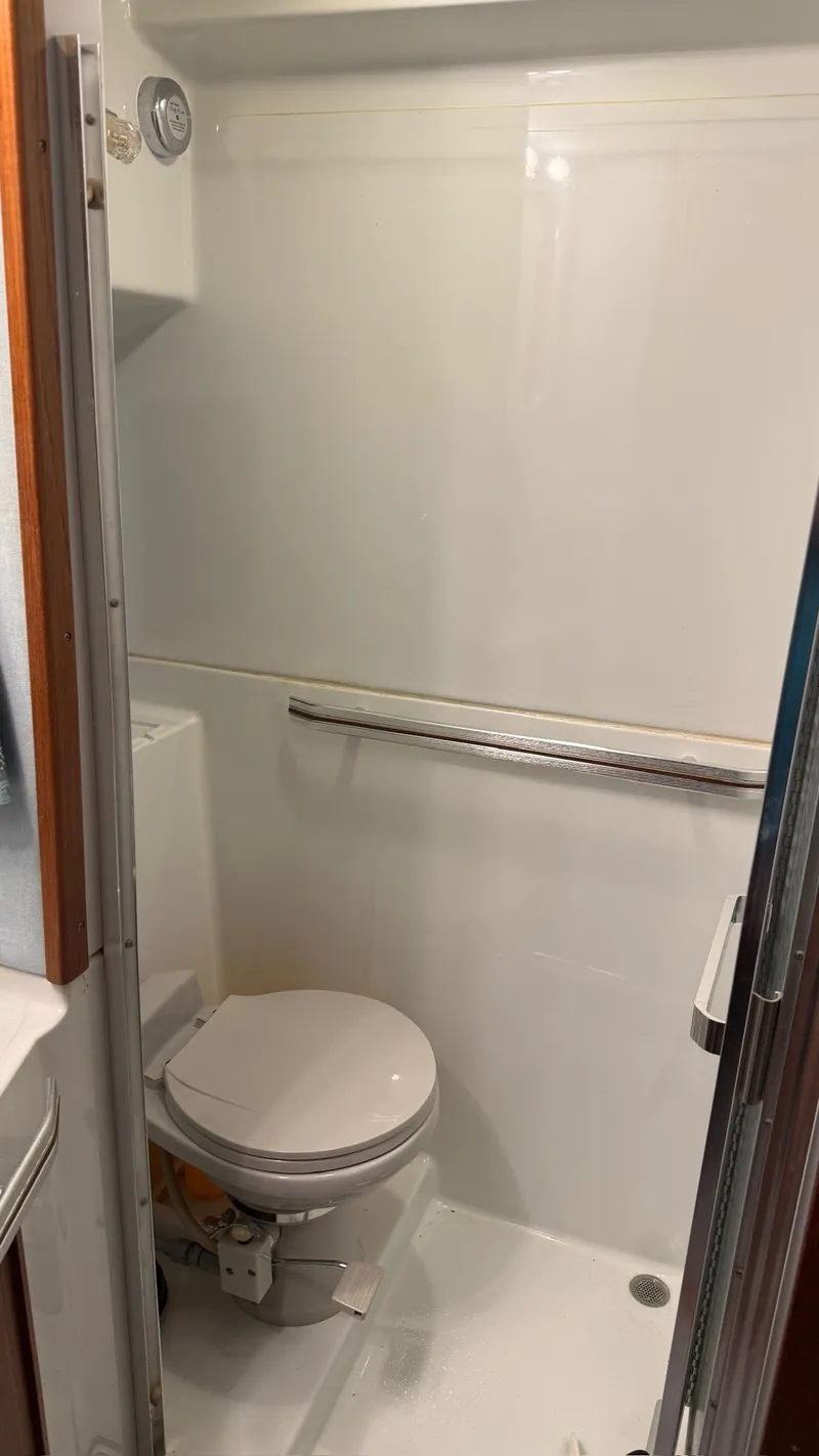 Slide: The Image of Bathroom of 1988 Sea Ray 415 Aft Cabin yacht. - 17