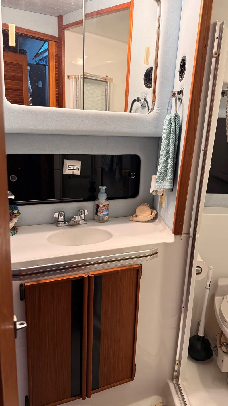 Slide: The Image of Bathroom of 1988 Sea Ray 415 Aft Cabin yacht. - 19
