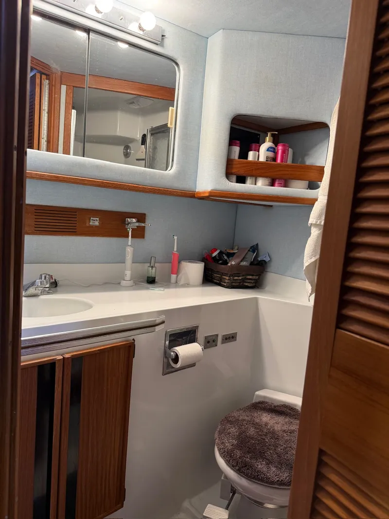 Slide: The Image of Bathroom of 1988 Sea Ray 415 Aft Cabin yacht. - 31