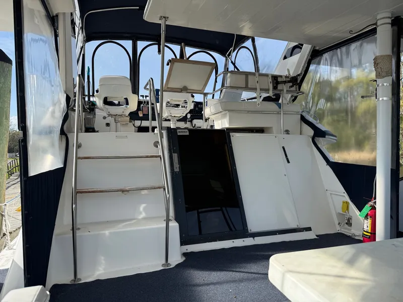 Slide: The Image of Interior of a 1988 Sea Ray 415 Aft Cabin yacht. - 5