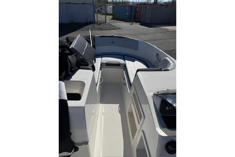 Slide: The Image of 2024 Bayliner Element M19 boat interior with seating and storage compartments. - 6