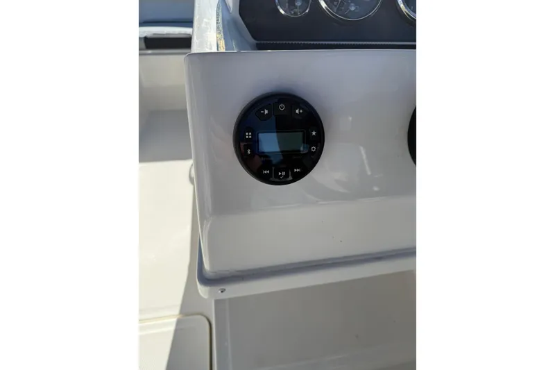 Slide: The Image of Control panel of 2024 Bayliner Element M19 boat, featuring a circular interface. - 8