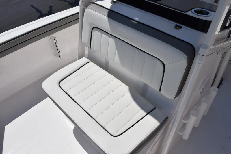 Slide: The Image of 2026 Yamaha Boats 190 FSH Sport, featuring sleek white seating with black trim. - 12