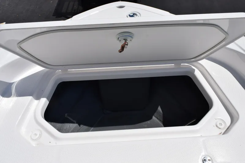 Slide: The Image of Open storage compartment on 2026 Yamaha Boats 190 FSH Sport. - 13