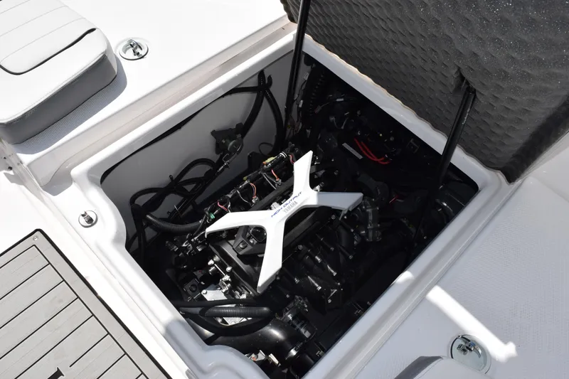 Slide: The Image of Engine compartment of 2026 Yamaha Boats 190 FSH Sport, showcasing internal components and design. - 20