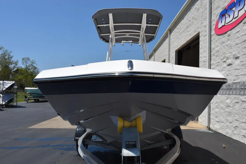 Slide: The Image of 2026 Yamaha Boats 190 FSH Sport on trailer, parked outside dealership. - 3