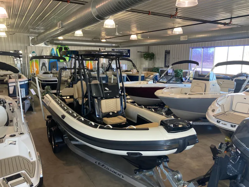 Slide: The Image of Highfield Sport 660 boat 2026 in a showroom. - 14