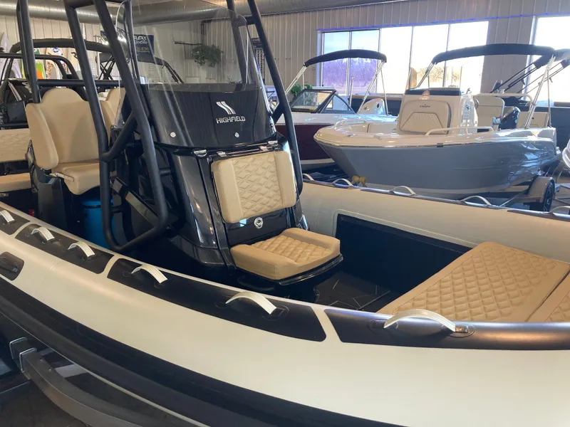 Slide: The Image of 2026 Highfield Sport 660 boat in showroom. - 15
