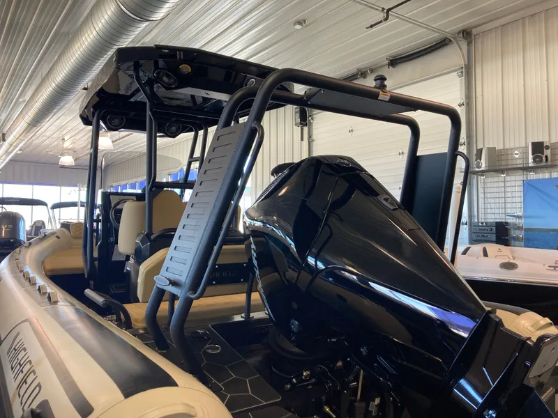 Slide: The Image of 2026 Highfield Sport 660 boat in a storage facility. - 5