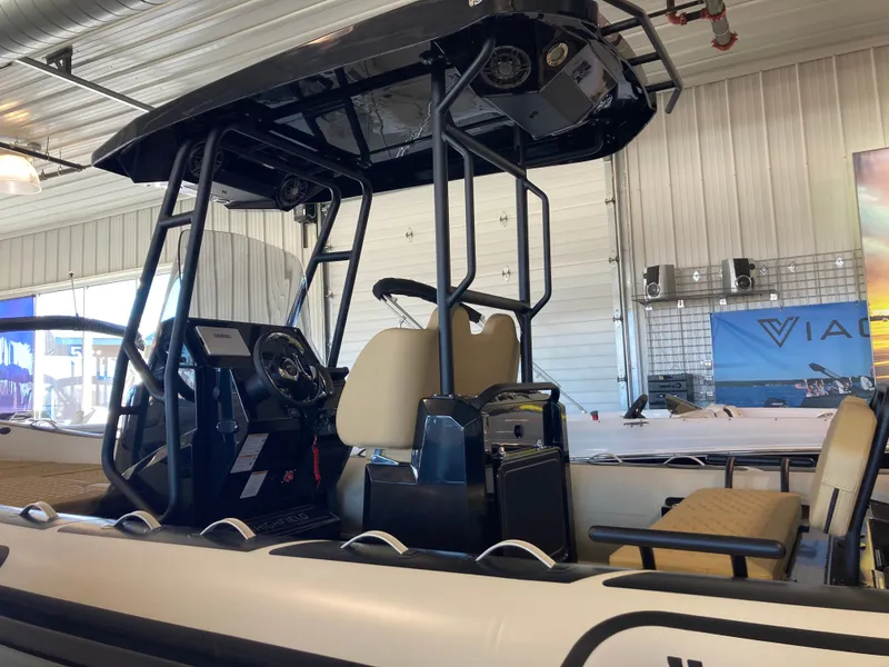 Slide: The Image of 2026 Highfield Sport 660 boat in showroom. - 6