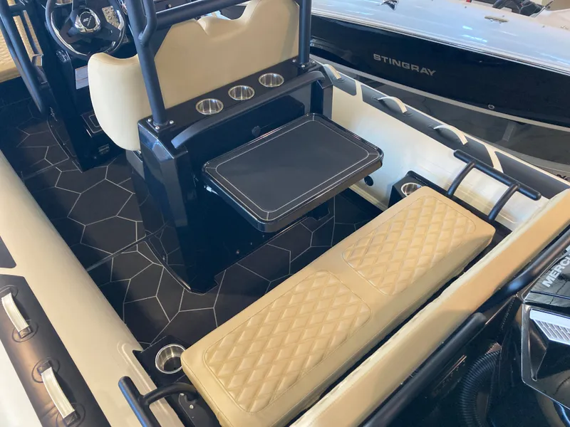 Slide: The Image of Interior of 2026 Highfield Sport 660 boat with seating and table. - 9