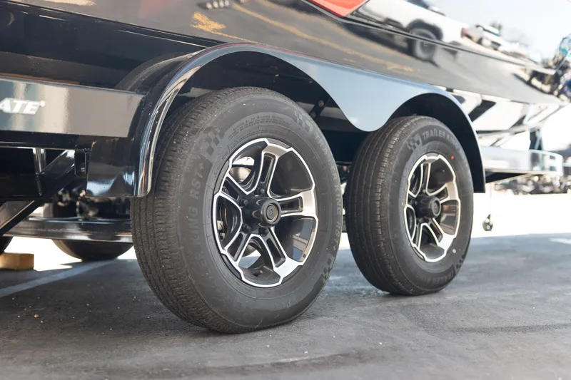 Slide: The Image of Trailer wheels of a 2025 Moomba Max boat, showcasing sleek design and durability. - 20