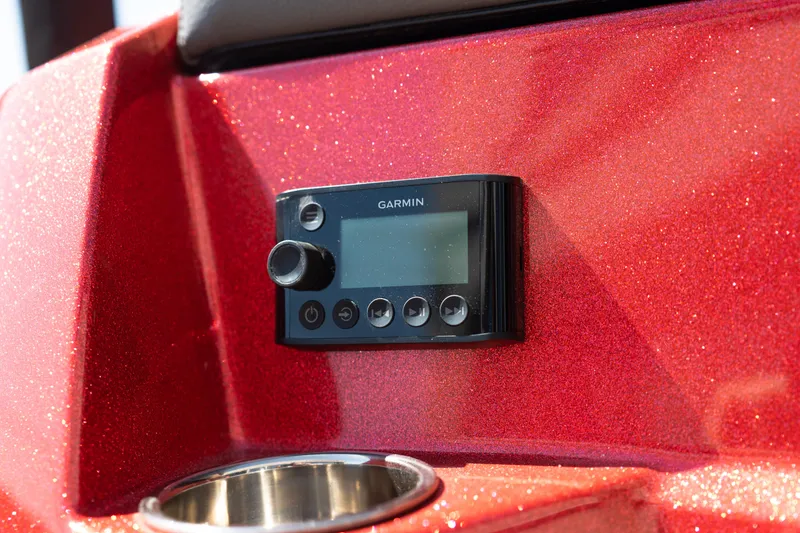 Slide: The Image of Garmin device on 2025 Moomba Max boat's sparkling red dashboard. - 5