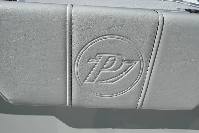 Slide: The Image of Embossed Parker logo on 2026 Parker 230 Coastal Elite boat seat. - 20