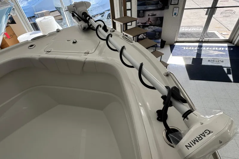 Slide: The Image of 2026 Parker 230 Coastal Elite boat with Garmin equipment in showroom. - 22