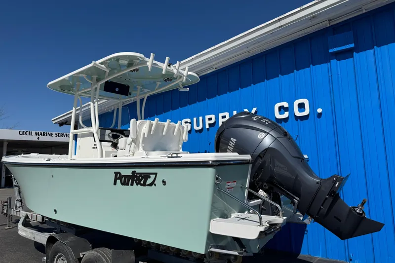 Slide: The Image of 2026 Parker 230 Coastal Elite boat with Yamaha engine at marine supply store. - 3
