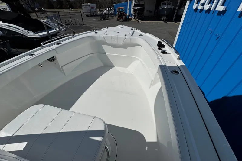 Slide: The Image of 2026 Parker 230 Coastal Elite boat interior, showcasing spacious seating and sleek design. - 9