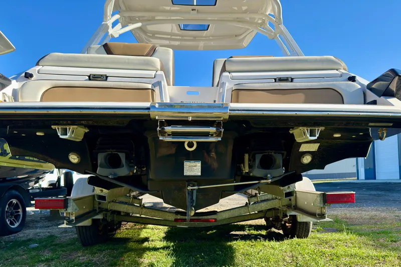 Slide: The Image of 2022 Yamaha Boats 275SD rear view showcasing dual engines and sleek design. - 10