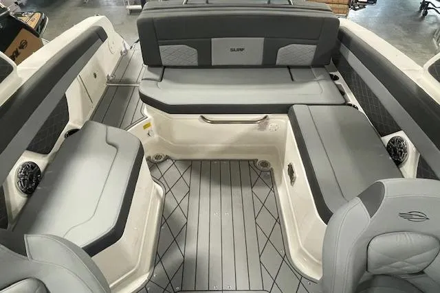 Slide: The Image of 2026 Chaparral SSX 6 boat interior with sleek gray seating and modern design. - 2
